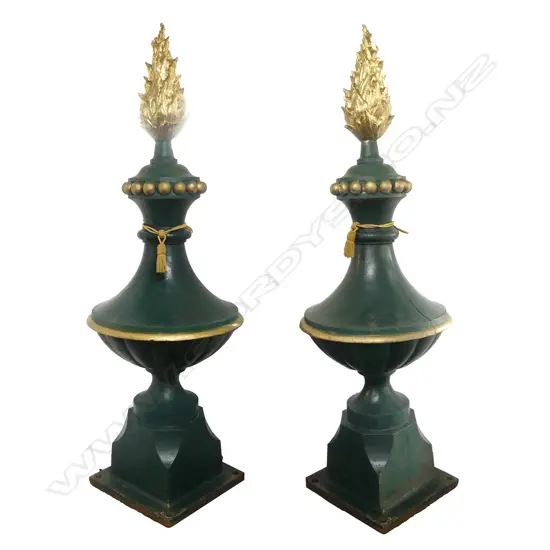 A pair of massive Victorian Italianate cast iron architectural finials