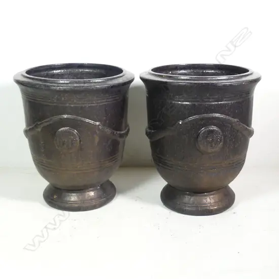 A pair of large dark glazed French 'Versailles' style garden urns