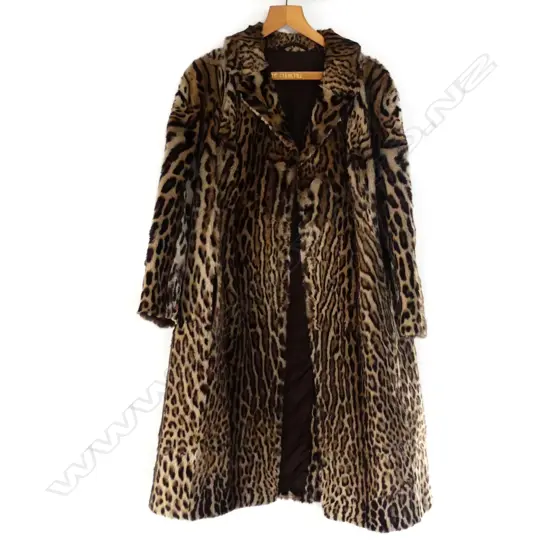 A mid-length ocelot fur coat
