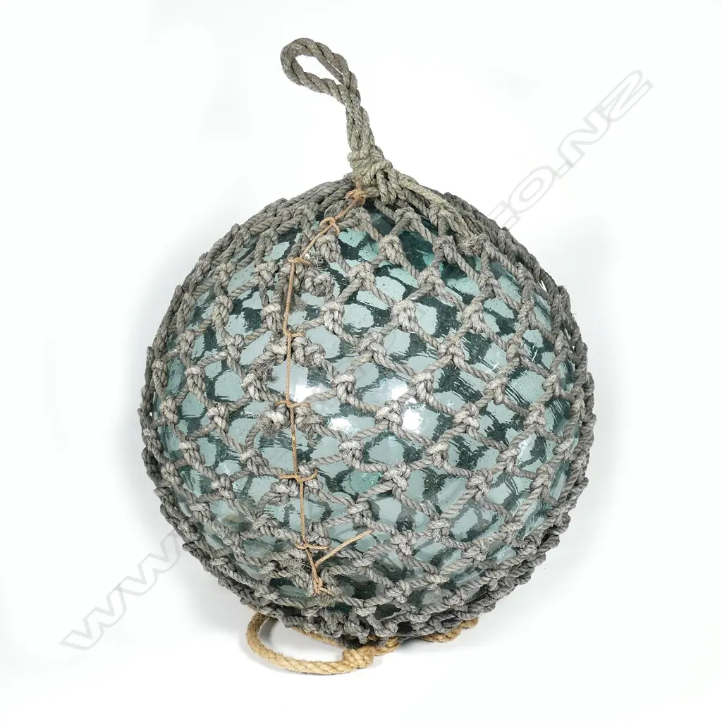 An old glass large fishing net float Image 1++