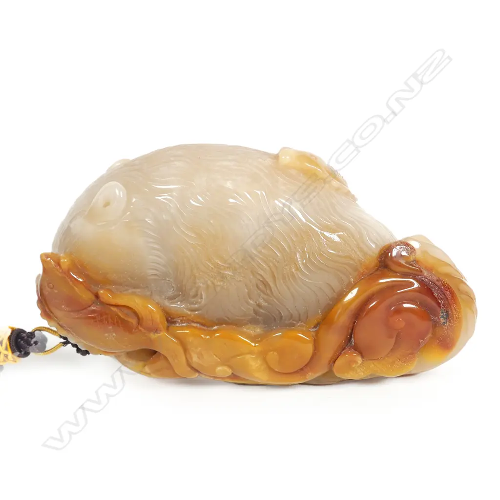 An uncommon large brown jadeite handling piece Image 1++