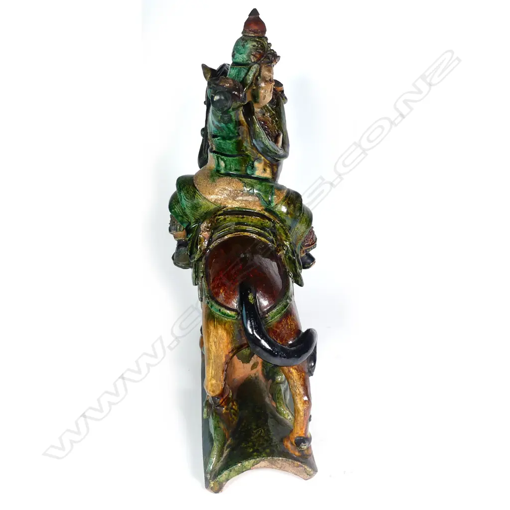 An old Chinese Sancai-glazed ridge tile of a warrior on horseback Image 1++