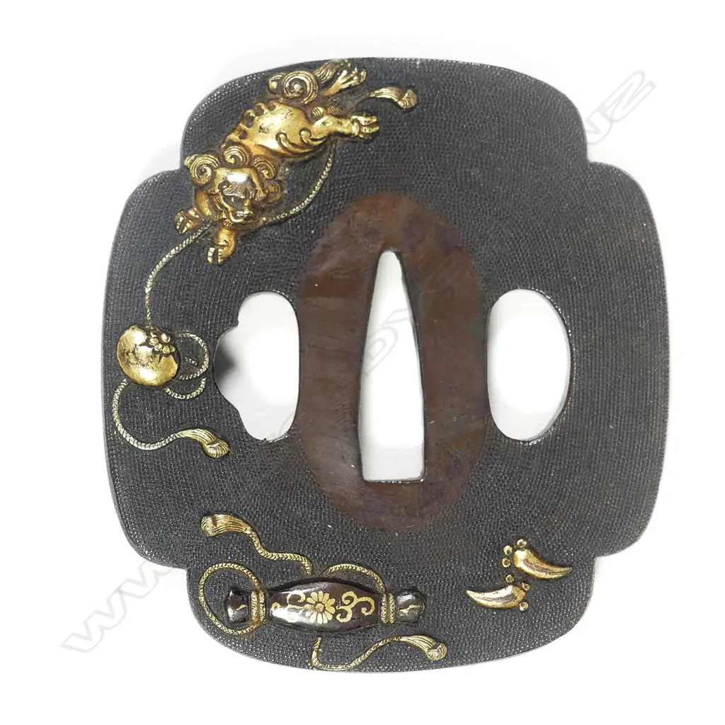 A Japanese tsuba Image 1++