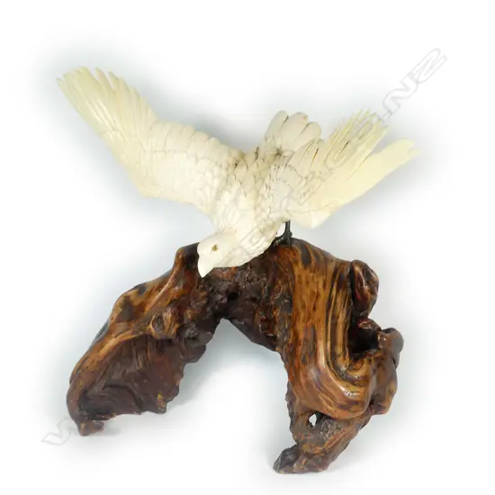 A fine and large Japanese Meiji period ivory okimono of an eagle