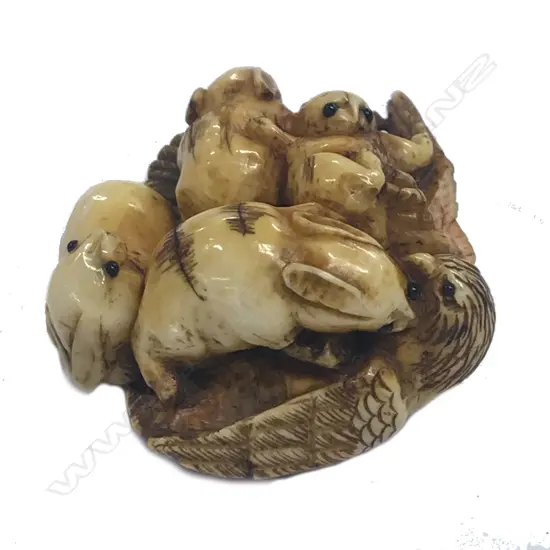 A finely carved Japanese ivory netsuke