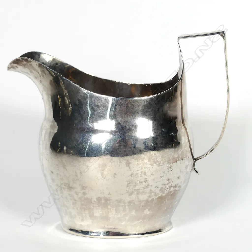 A late Georgian silver creamer Image 1++