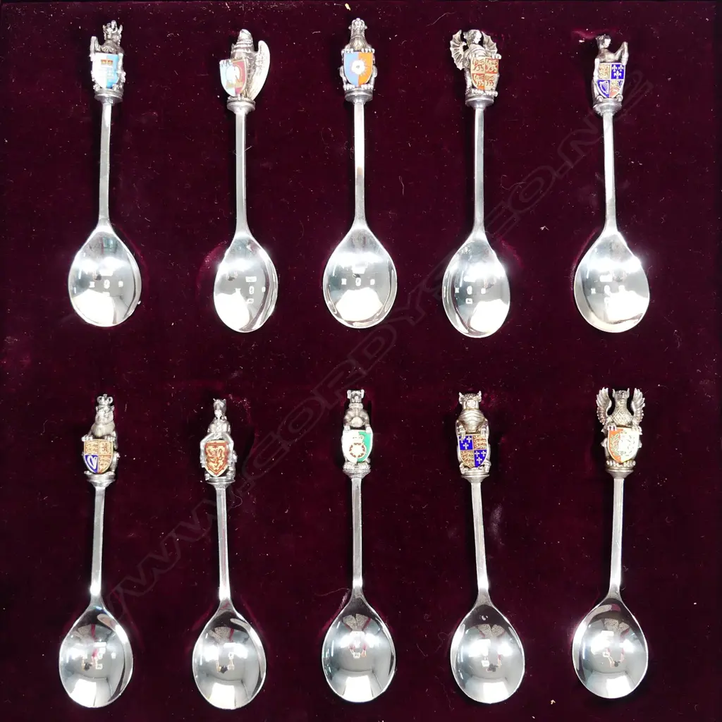A boxed set of ten silver spoons - 'Sovereign Queen's Spoon Collection' [The Queen's Beast's] Image 1++