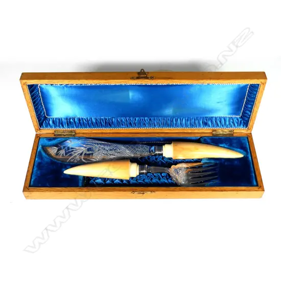 A pair of Victorian silver plate and ivory fish servers