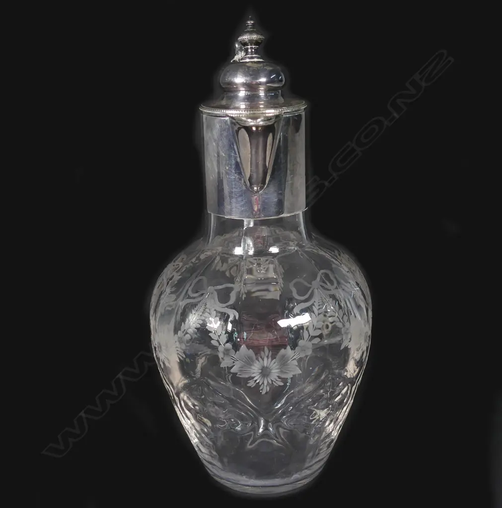 An Edwardian crystal and silver plate claret jug Image 1++