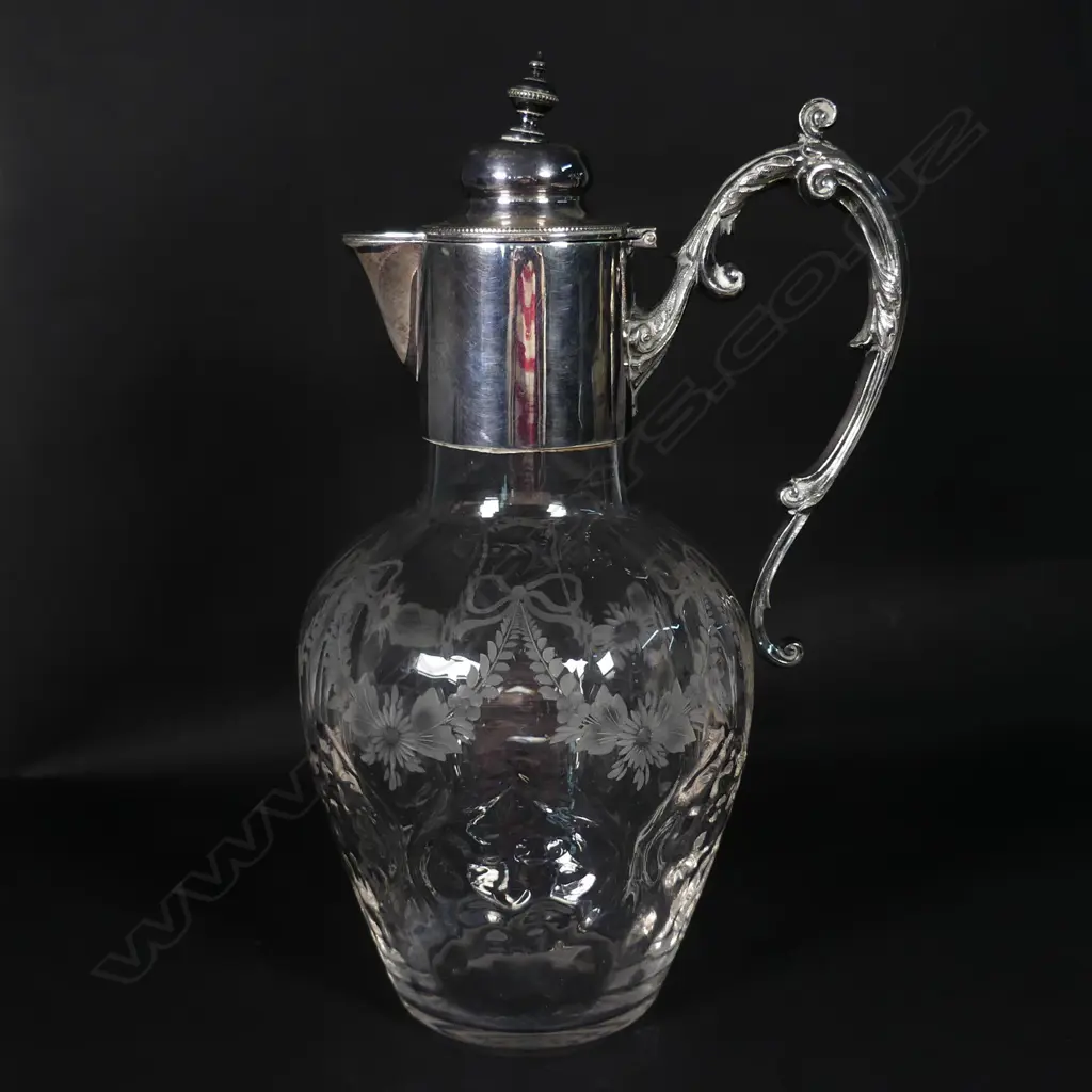 An Edwardian crystal and silver plate claret jug Image 1++