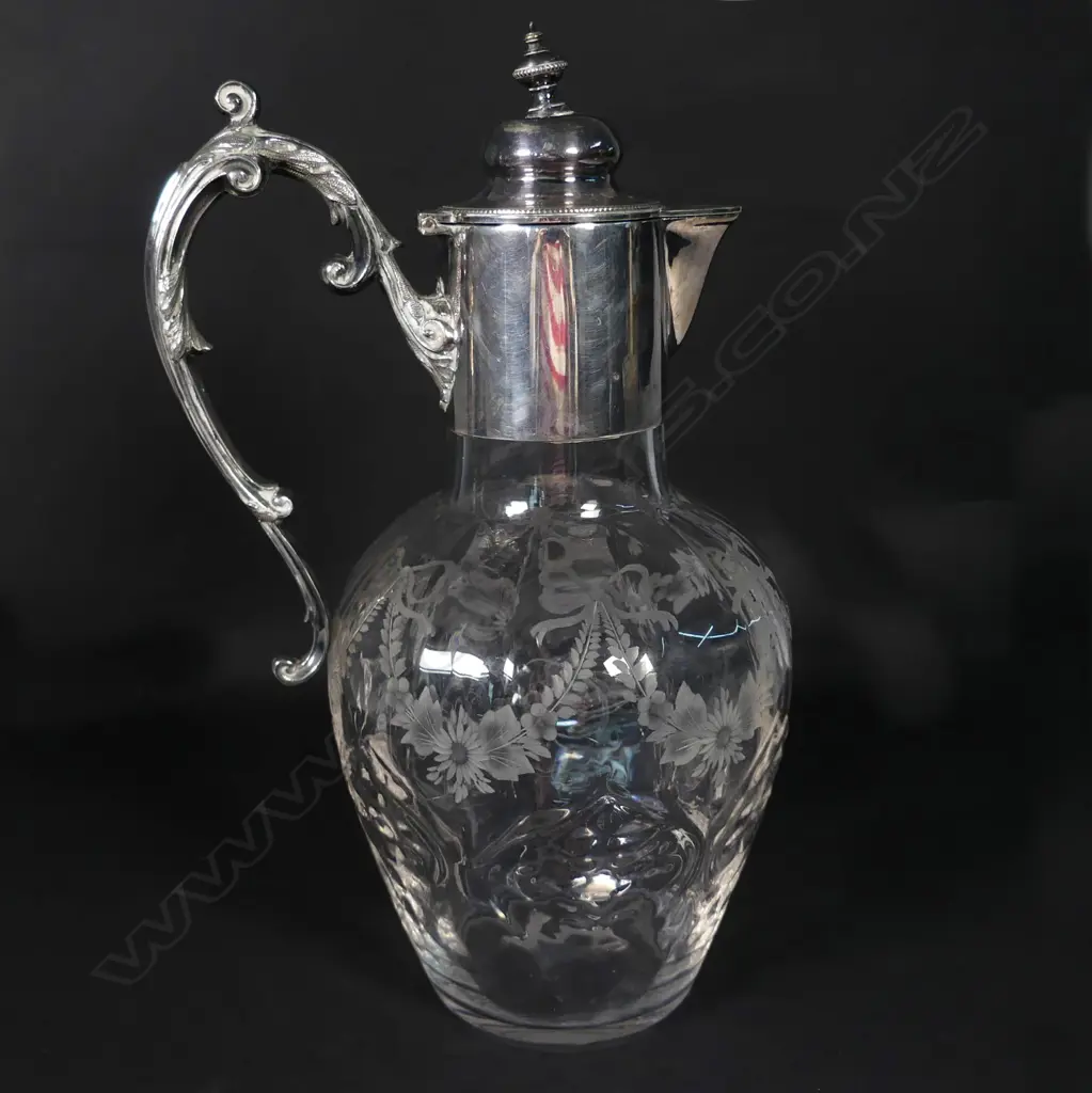 An Edwardian crystal and silver plate claret jug Image 1++
