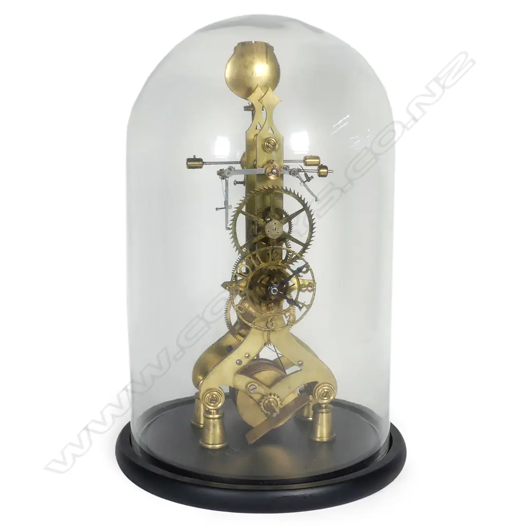 A brass skeleton clock Image 1++