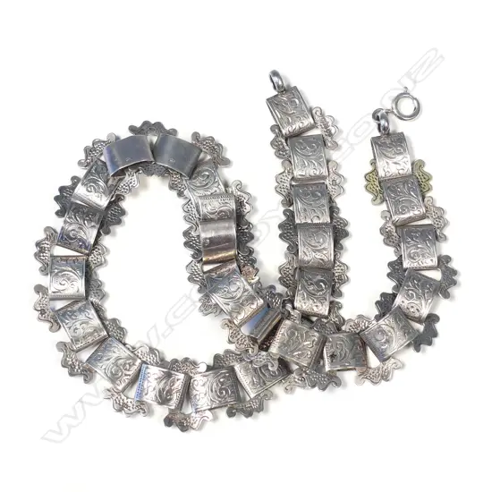 A late 19thC engraved silver necklace