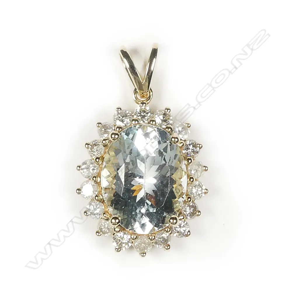 A 14ct gold aquamarine and diamond pendant Image 1++