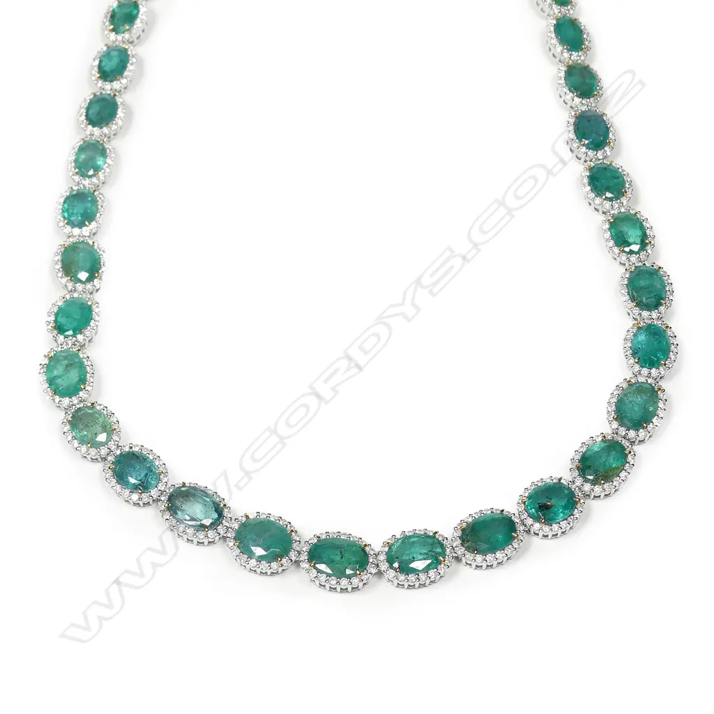 An impressive platinum emerald and diamond necklace Image 1++
