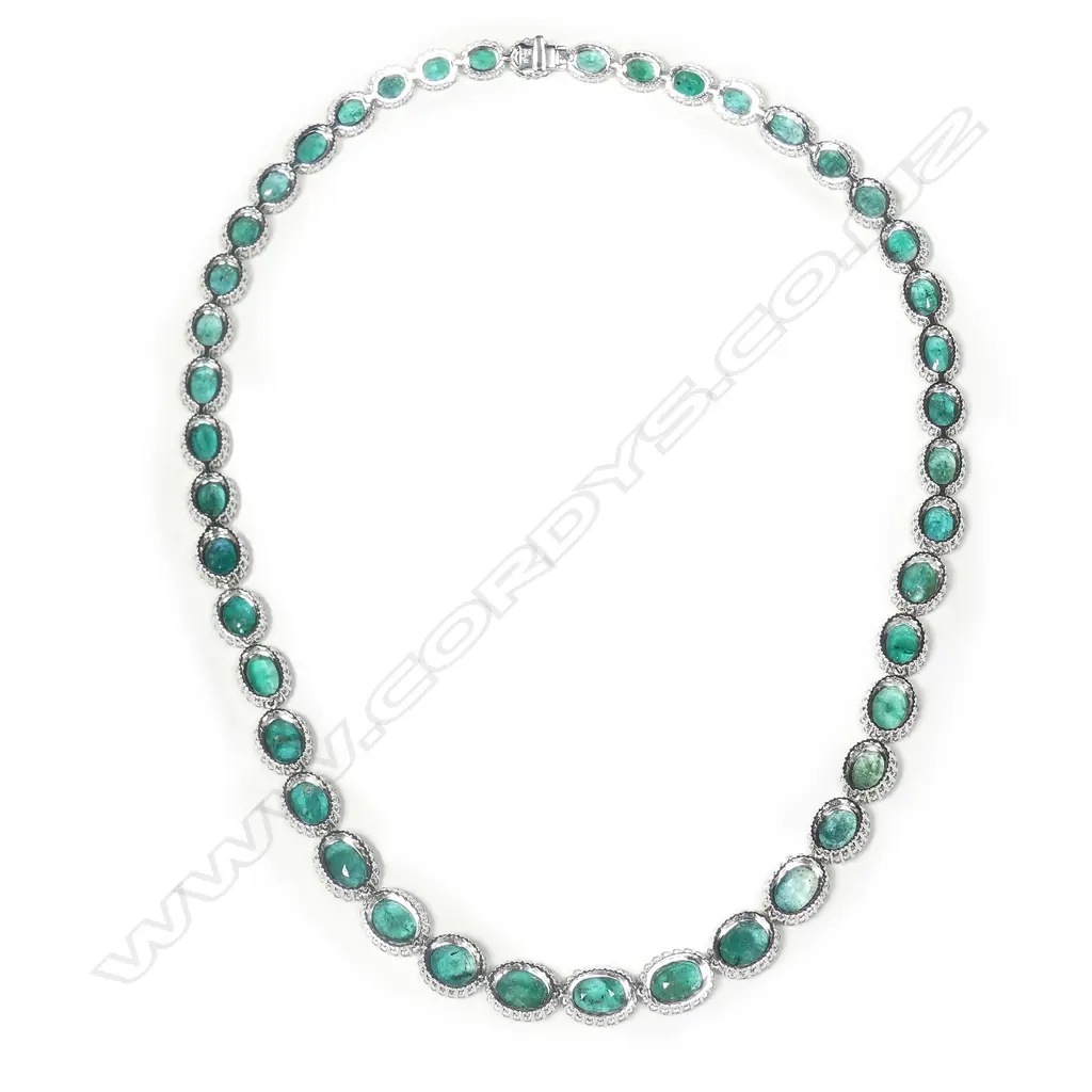An impressive platinum emerald and diamond necklace Image 1++