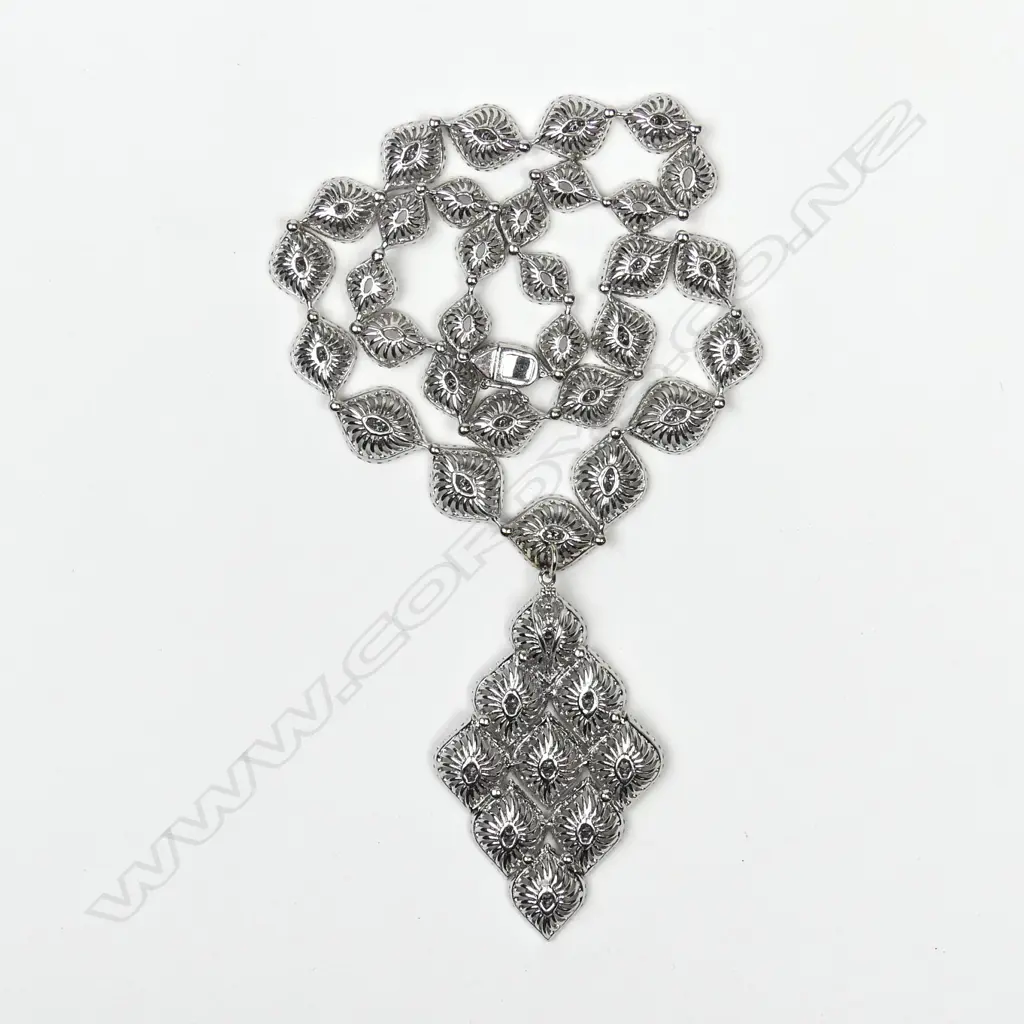 An impressive 18ct. gold white gold and multi-diamond pendant necklace Image 1++