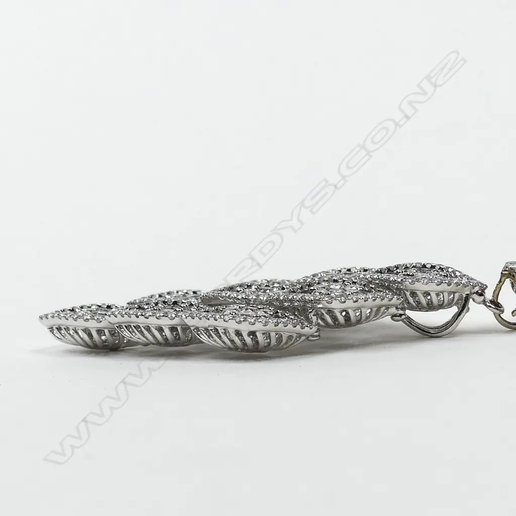 An impressive 18ct. gold white gold and multi-diamond pendant necklace Image 1++