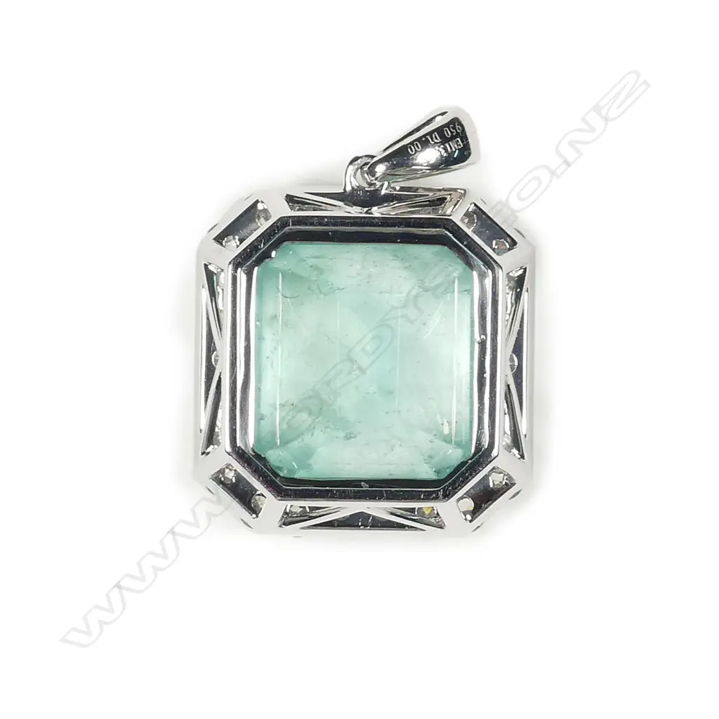 A platinum emerald and diamond pendant Image 1++