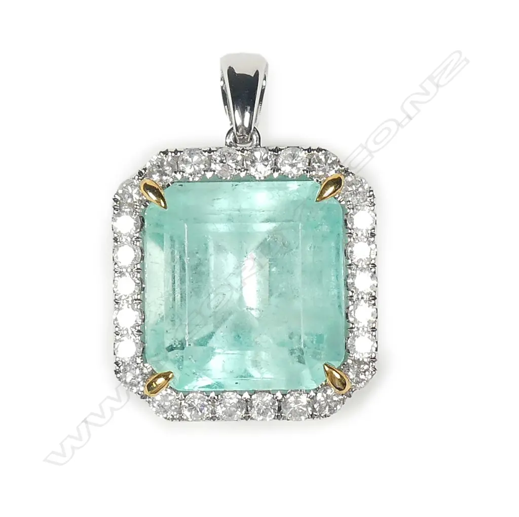 A platinum emerald and diamond pendant Image 1++