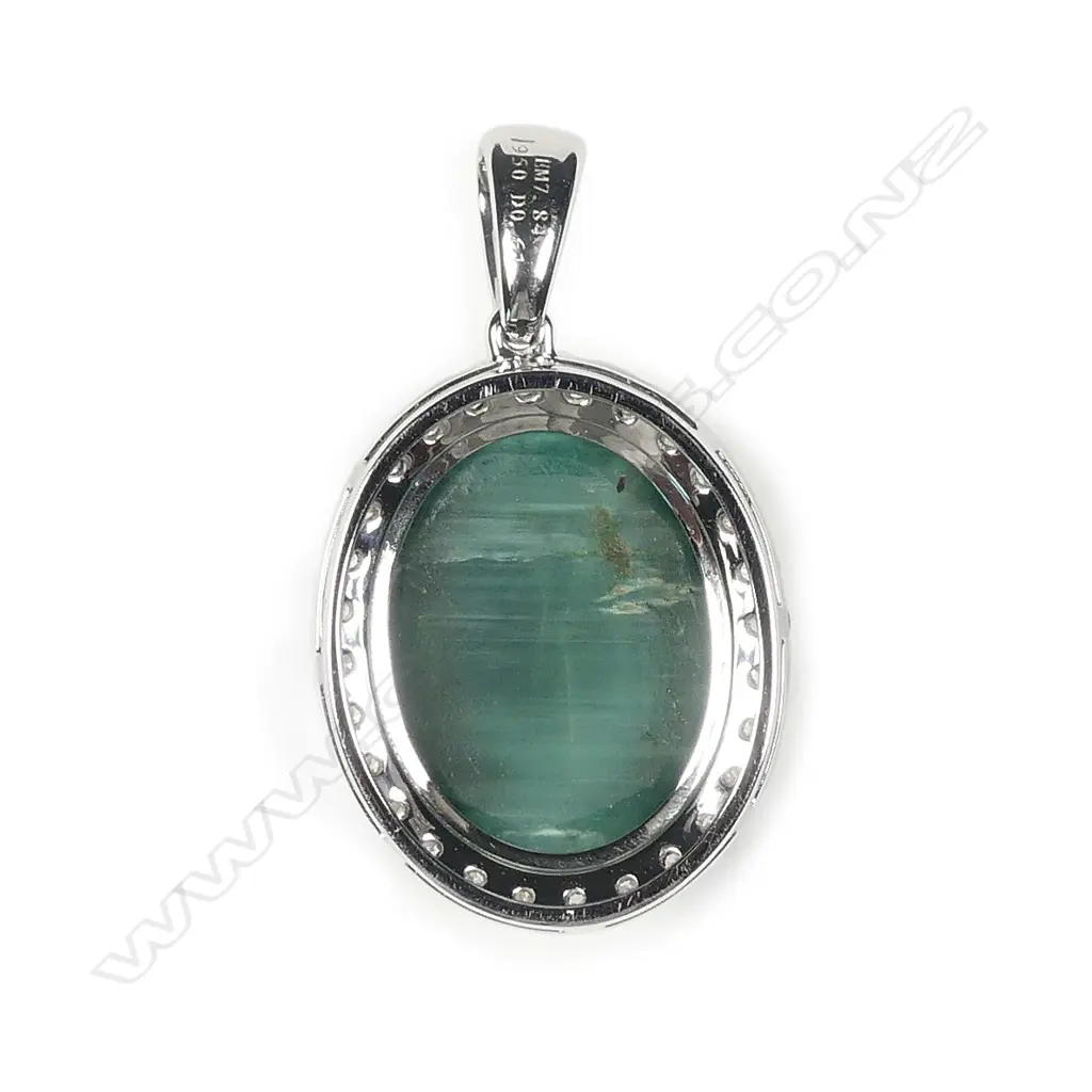 A platinum emerald and diamond pendant Image 1++