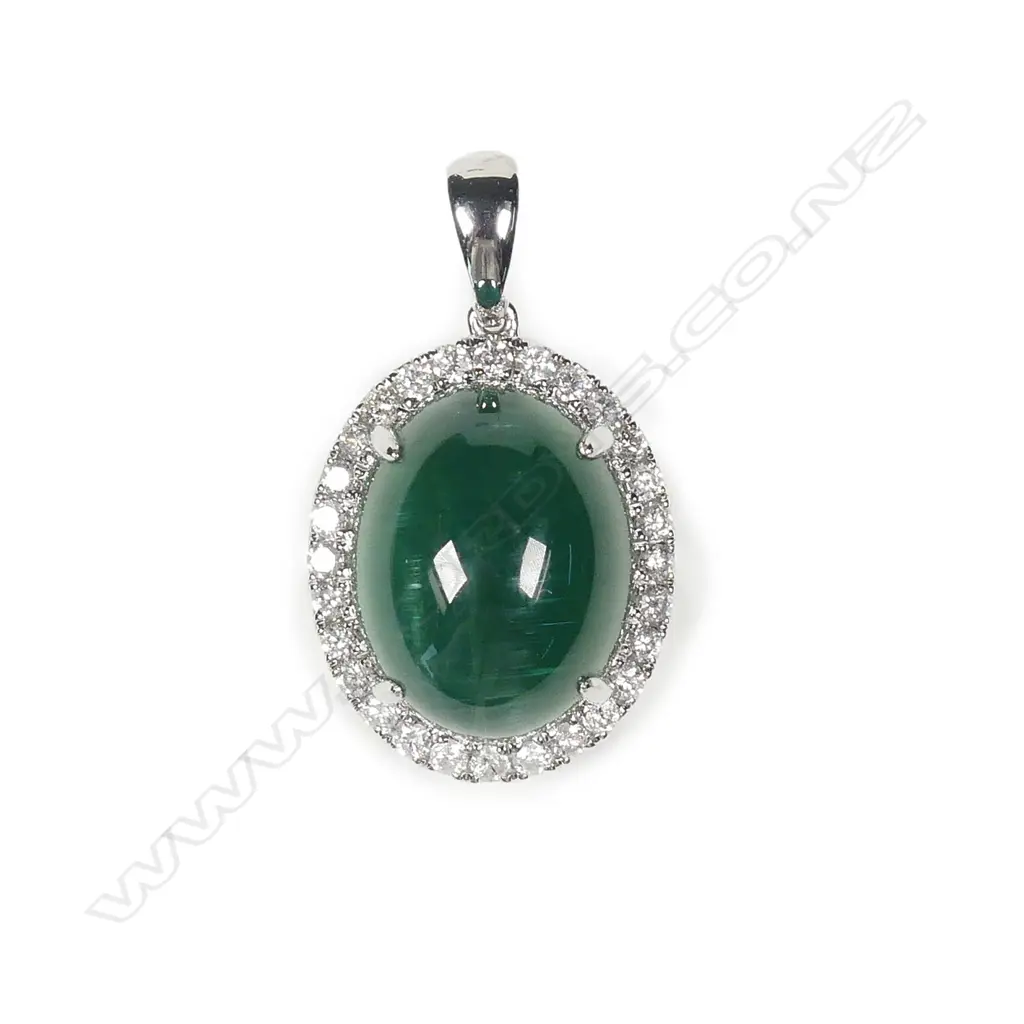 A platinum emerald and diamond pendant Image 1++