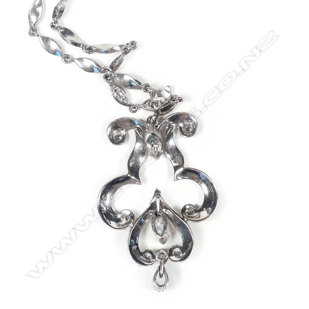 A 9ct white gold diamond set necklace Image 1++