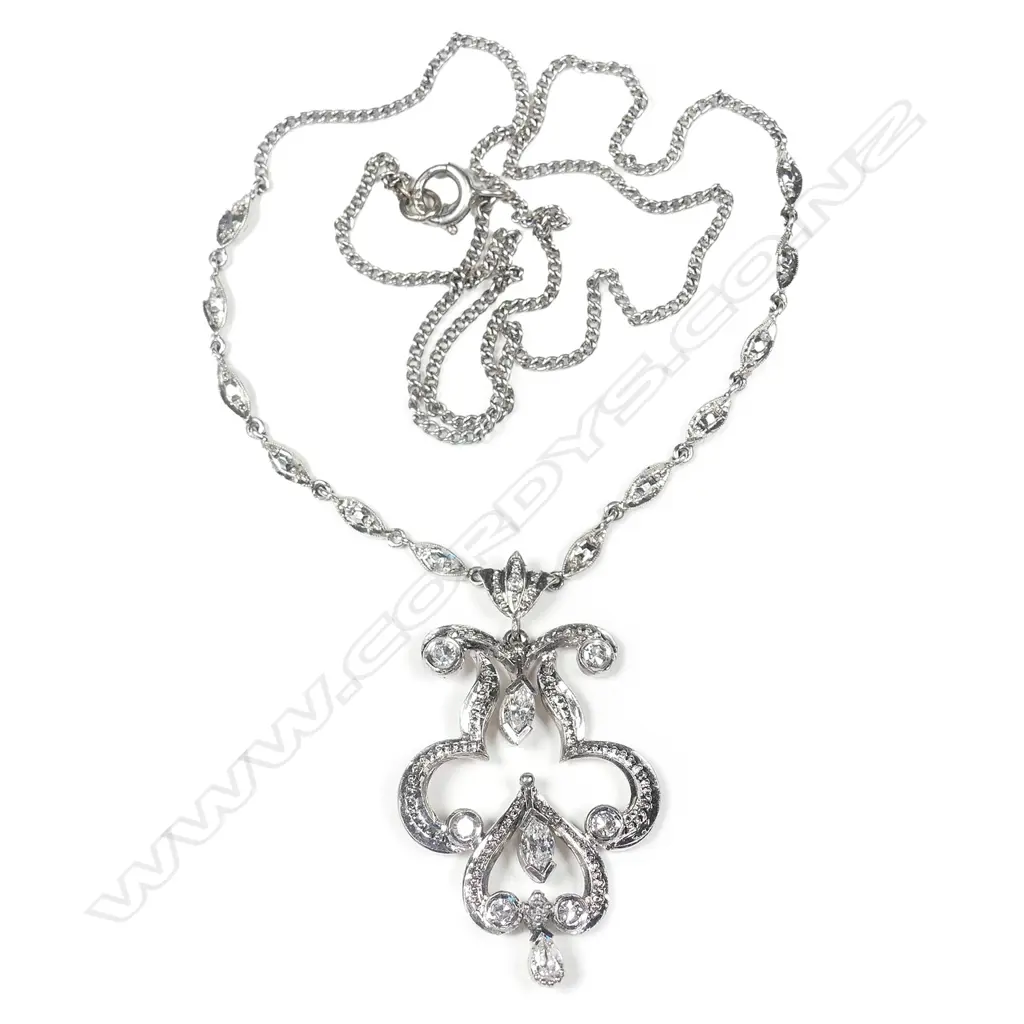 A 9ct white gold diamond set necklace Image 1++
