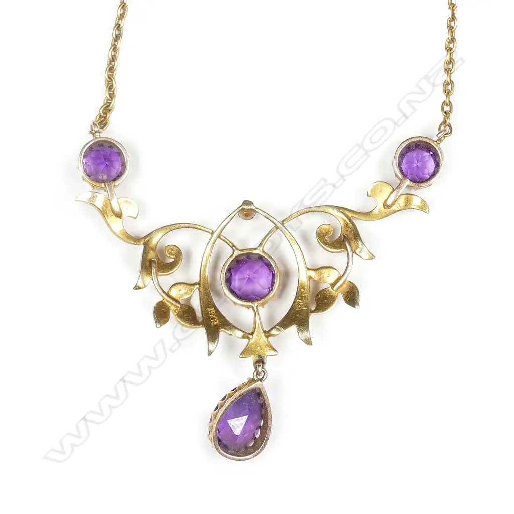 A c.1890 Victorian 15ct yellow gold amethyst and seed pearl scrolling pendant on chain Image 1++