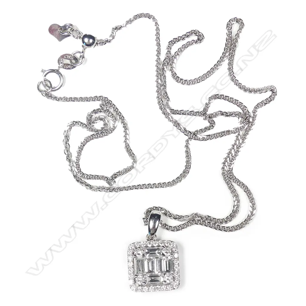 An 18ct. white gold and diamond pendant on chain Image 1++