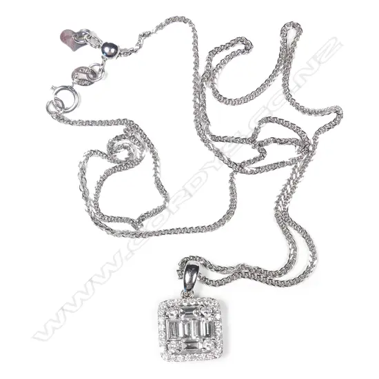 An 18ct. white gold and diamond pendant on chain