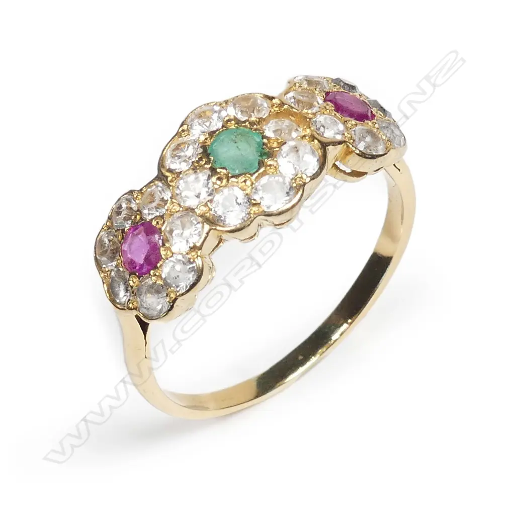 An 18ct gold ruby emerald and white sapphire ring Image 1++
