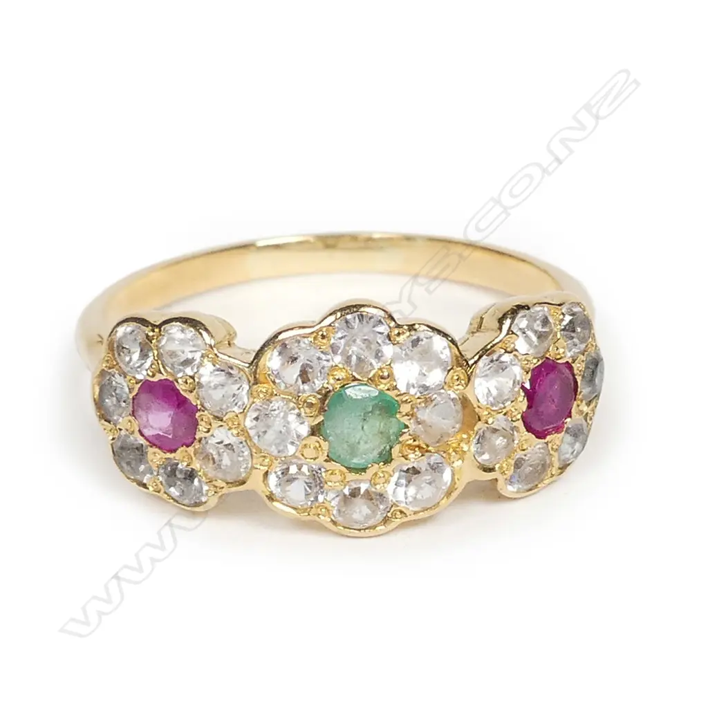 An 18ct gold ruby emerald and white sapphire ring Image 1++