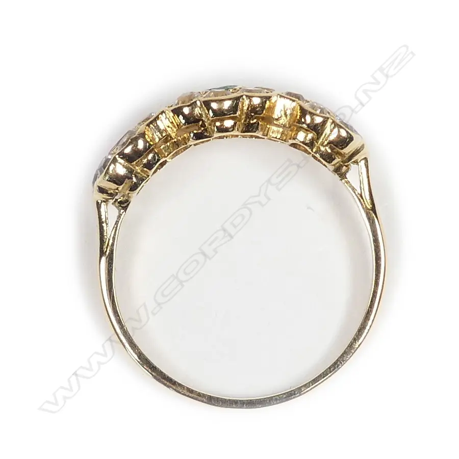 An 18ct gold ruby emerald and white sapphire ring Image 1++