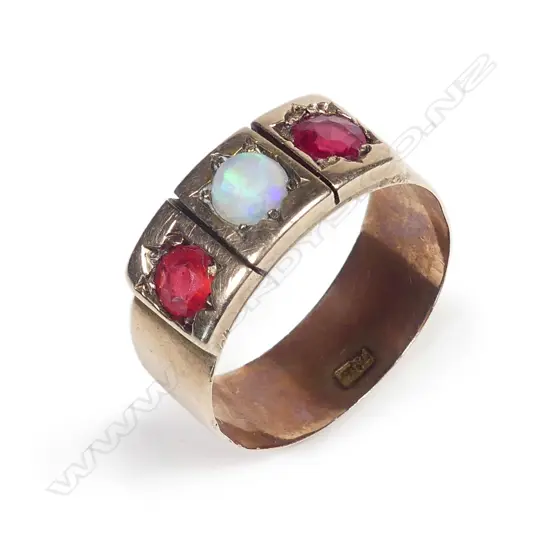 An estate 9ct rose gold opal and garnet ring