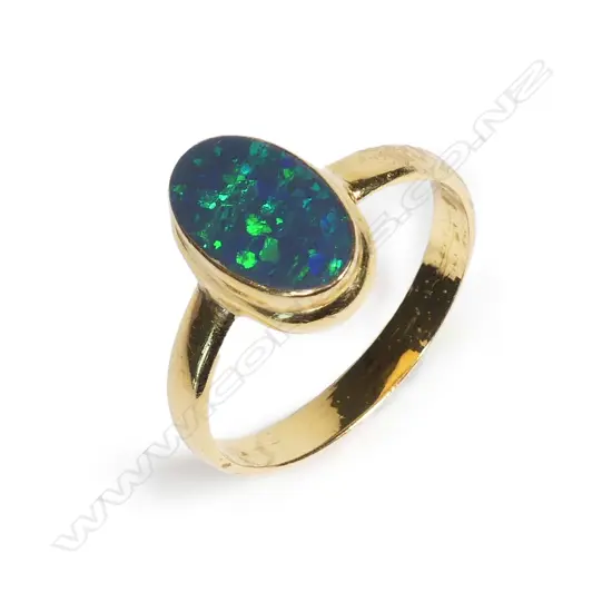 A 22ct gold and opal ring