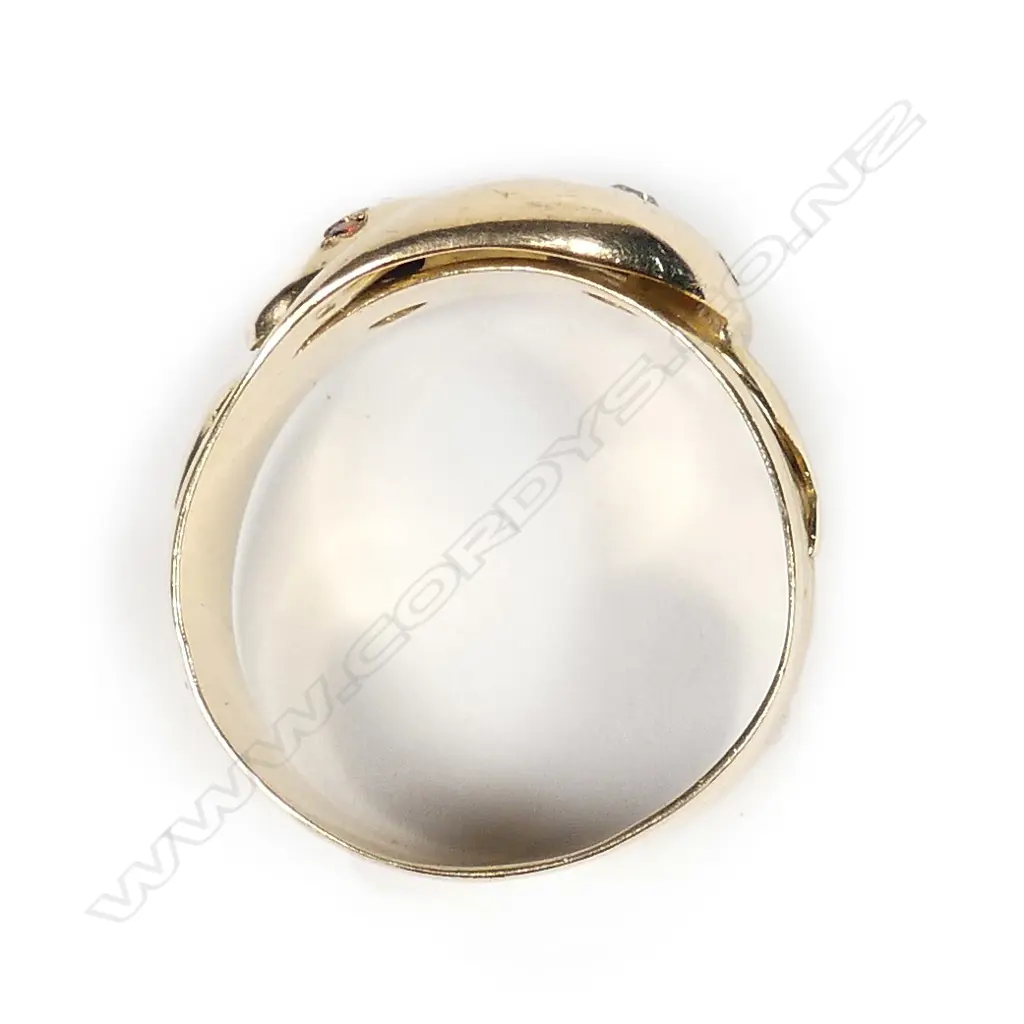 An early 1900s 18ct gold diamond and garnet snake ring Image 1++