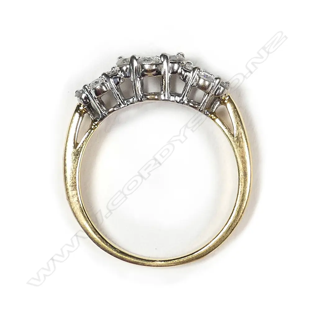 An 18ct yellow and white gold triple cluster diamond set ring Image 1++