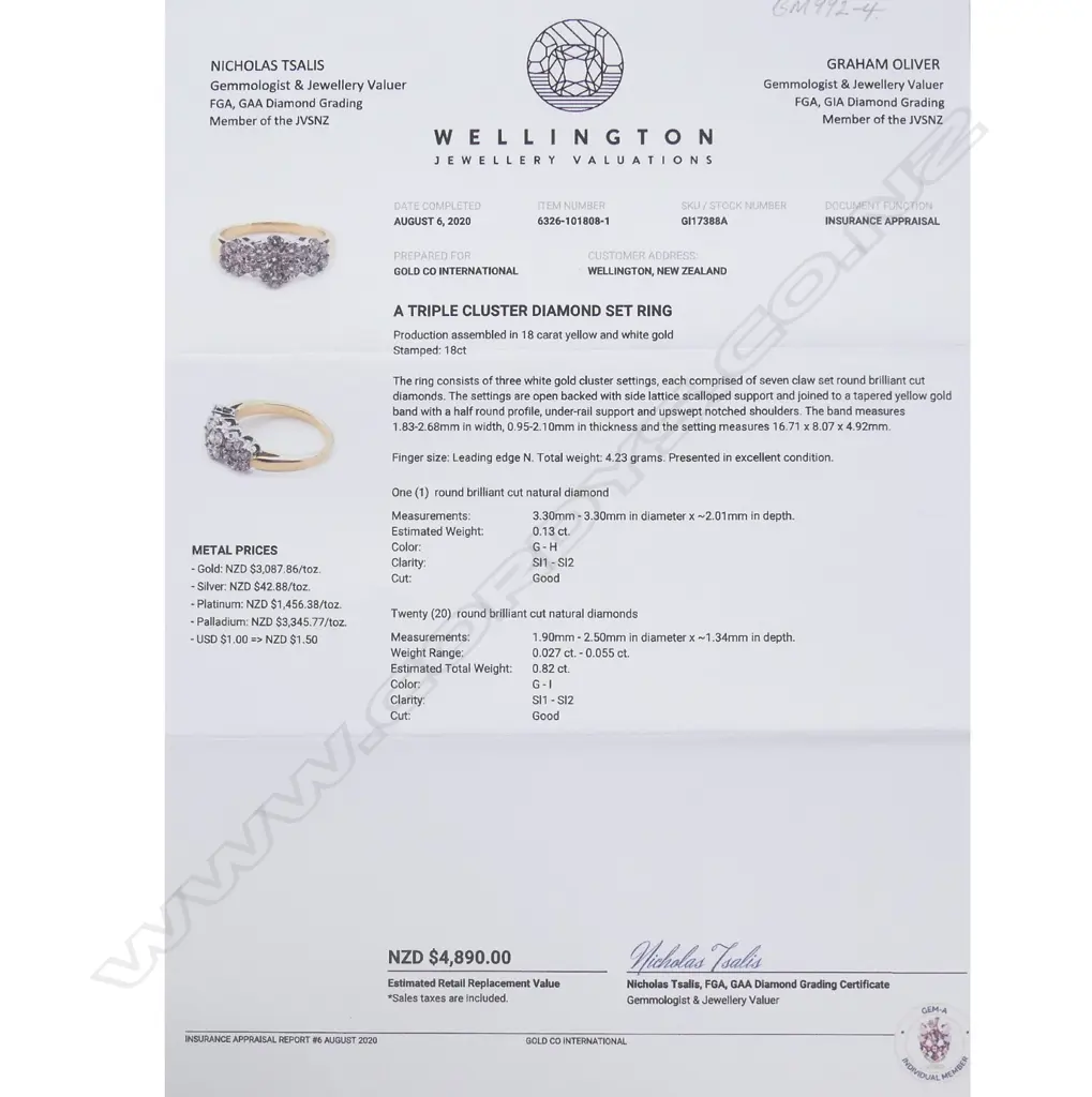 An 18ct yellow and white gold triple cluster diamond set ring Image 1++