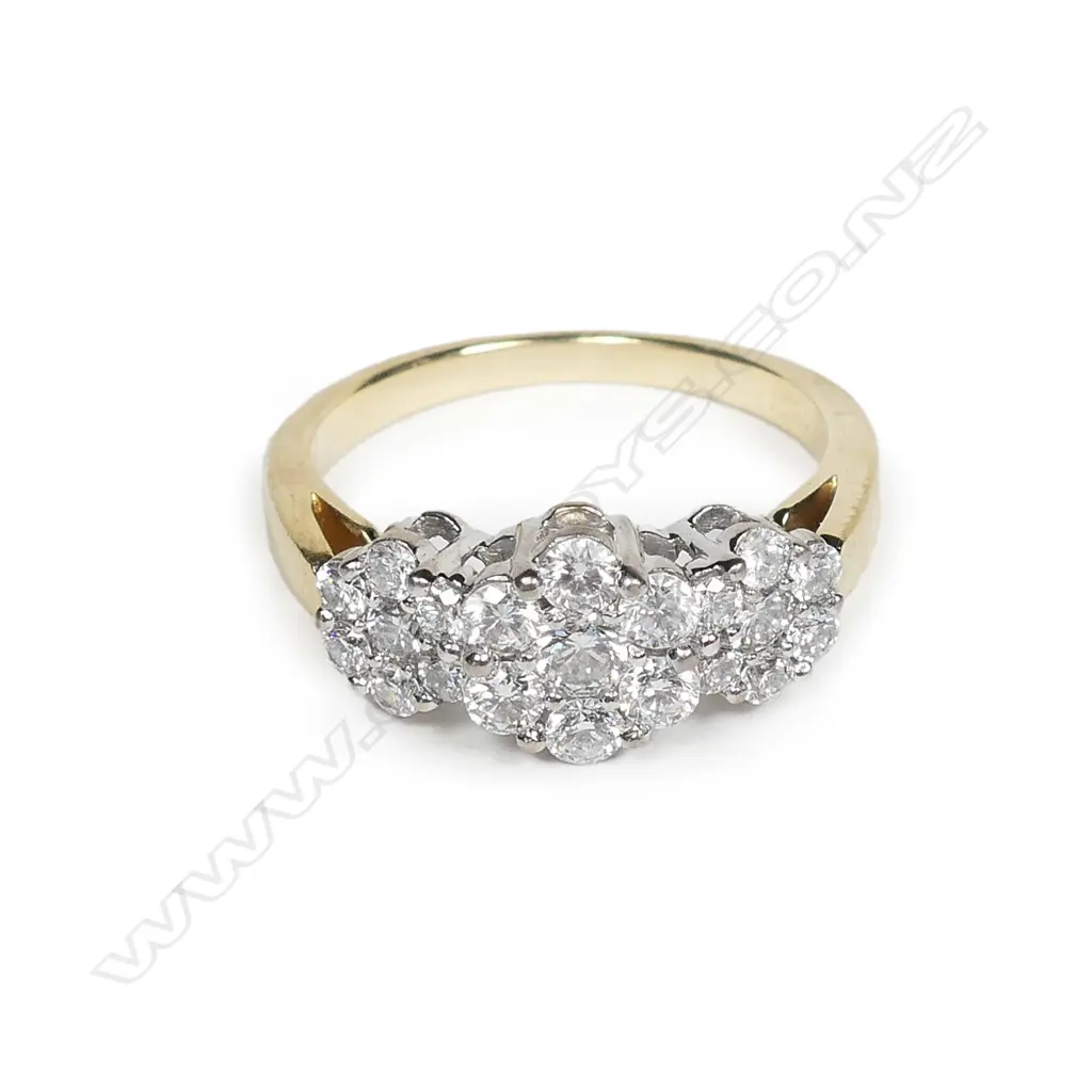 An 18ct yellow and white gold triple cluster diamond set ring Image 1++