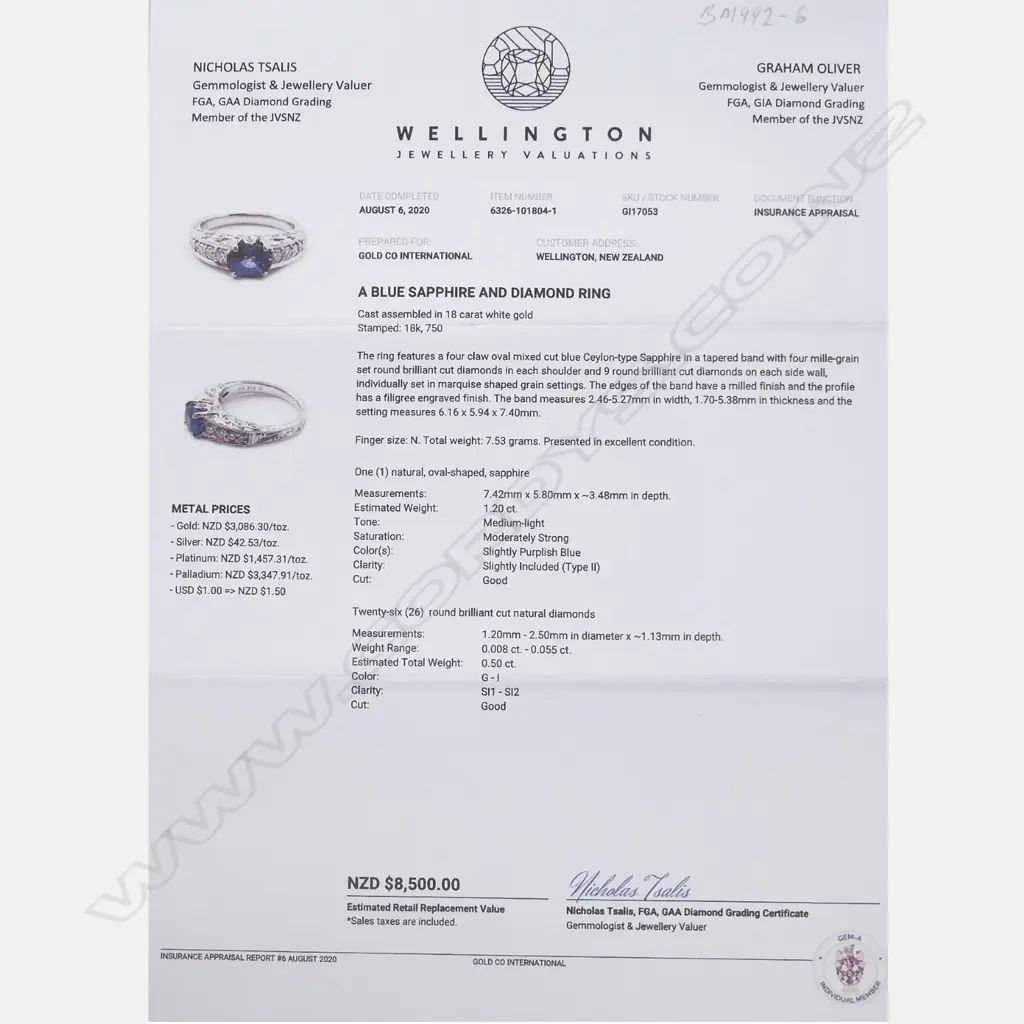 An 18ct white gold sapphire and diamond ring Image 1++