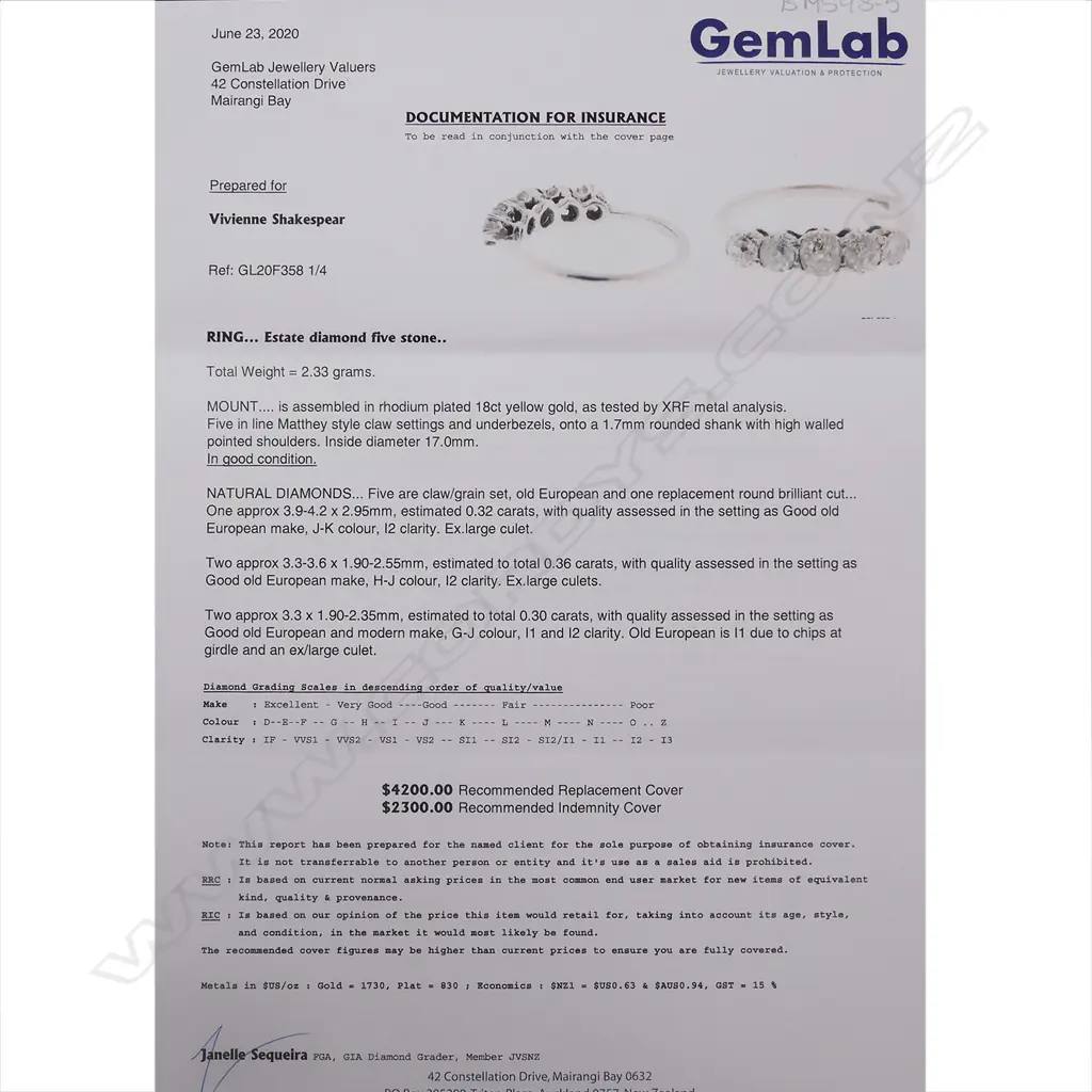 An 18ct white gold and five stone diamond ring Image 1++