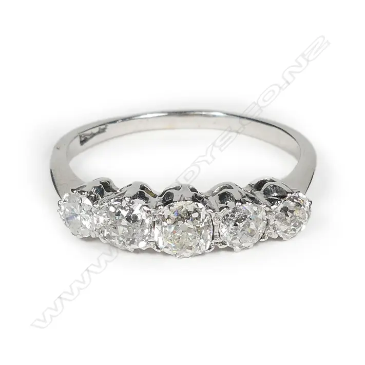 An 18ct white gold and five stone diamond ring Image 1++