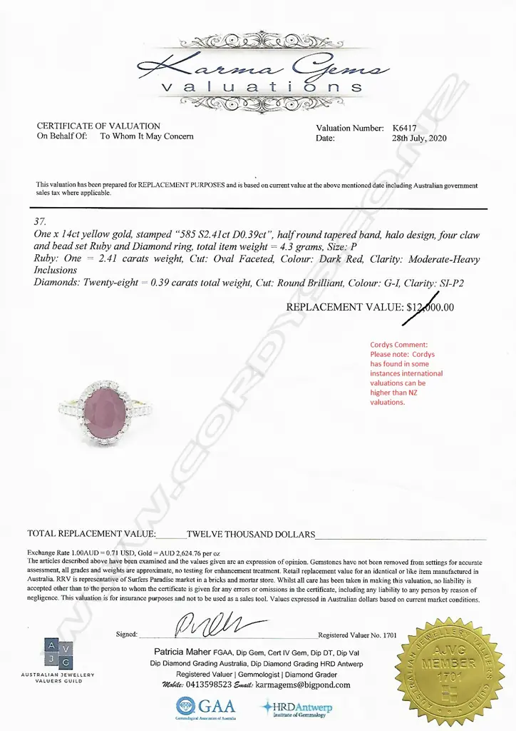 A 14ct gold ruby and diamond halo ring Image 1++