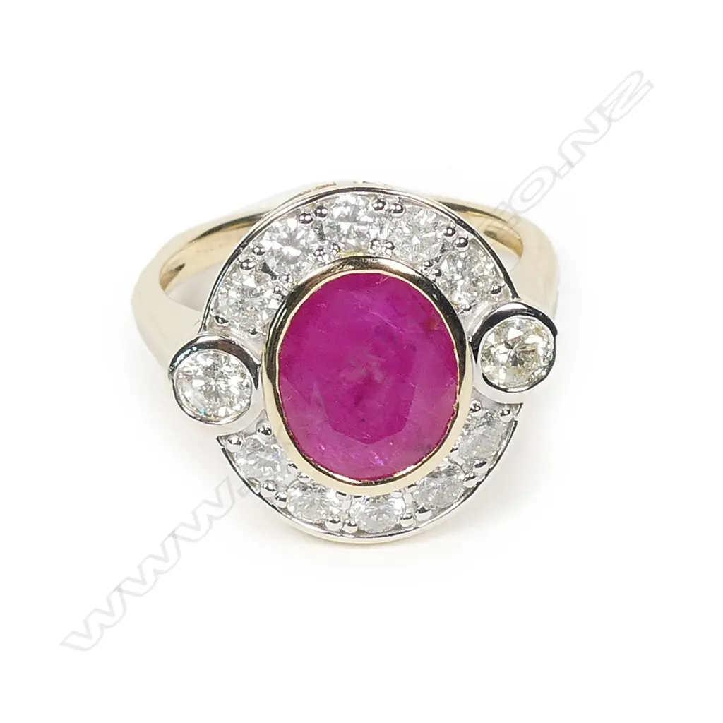 A 14ct gold ruby and diamond ring Image 1++