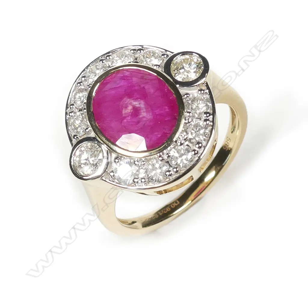 A 14ct gold ruby and diamond ring Image 1++