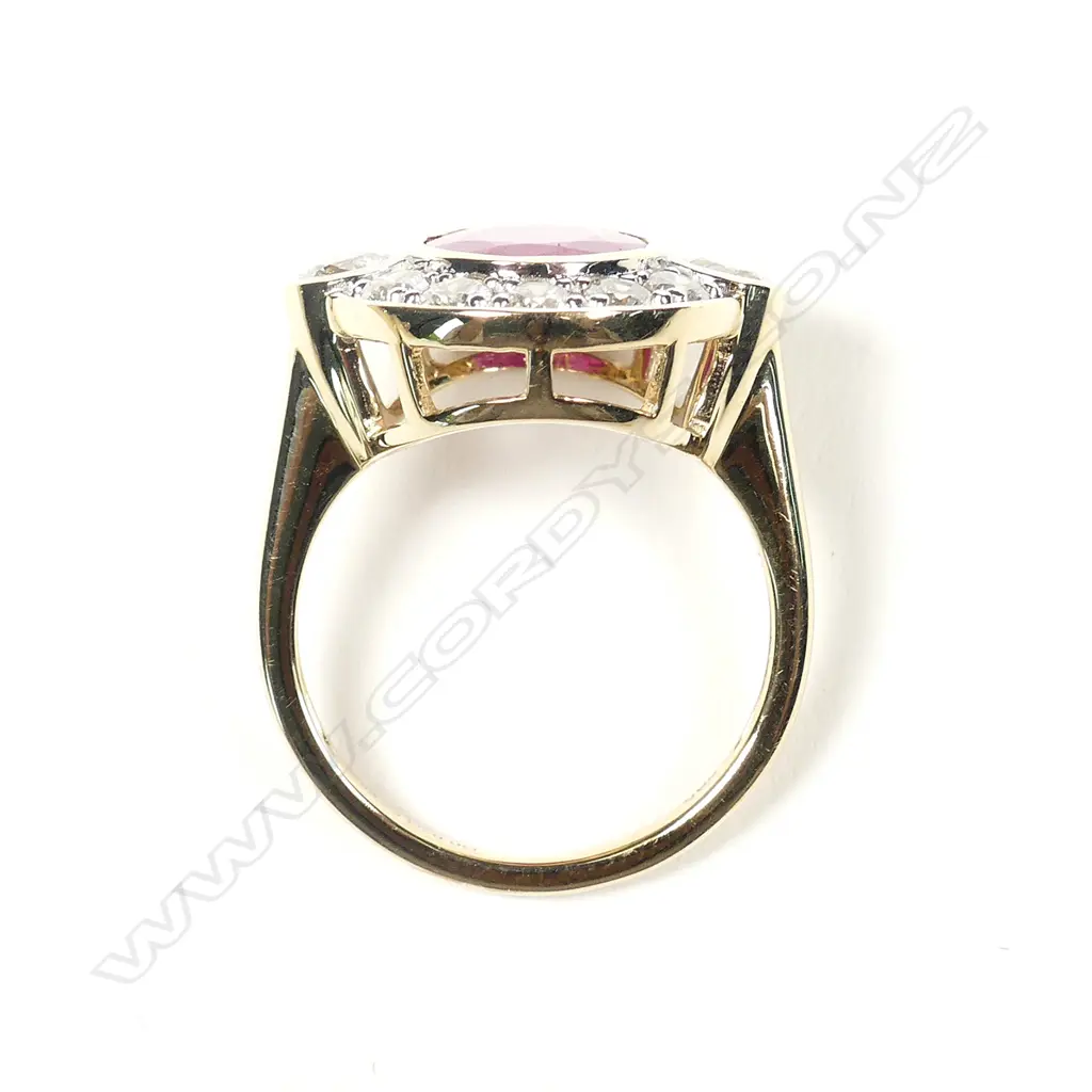 A 14ct gold ruby and diamond ring Image 1++