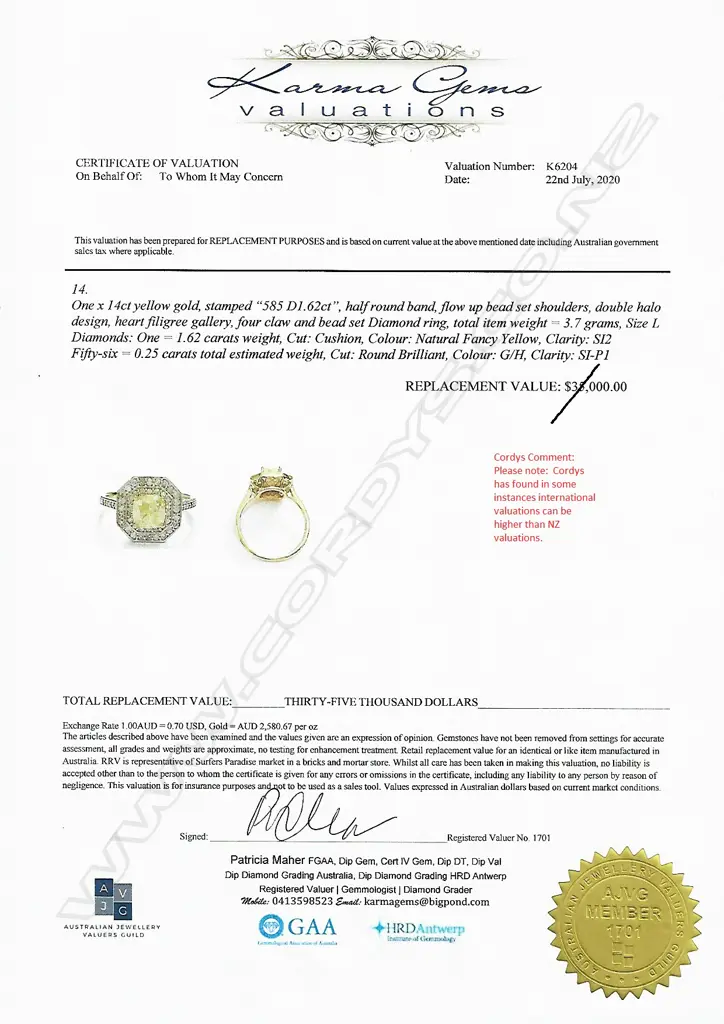 A 14ct gold double halo diamond ring Image 1++