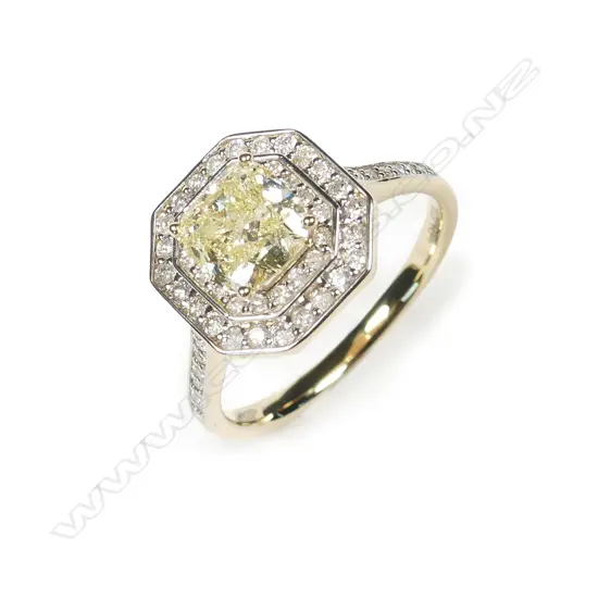 A 14ct gold double halo diamond ring