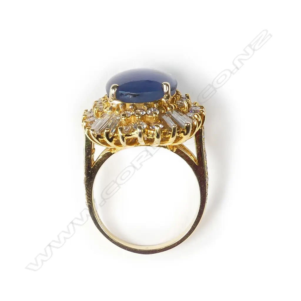 A 1970s impressive 18ct star sapphire and multi diamond 'Ballerina' ring Image 1++